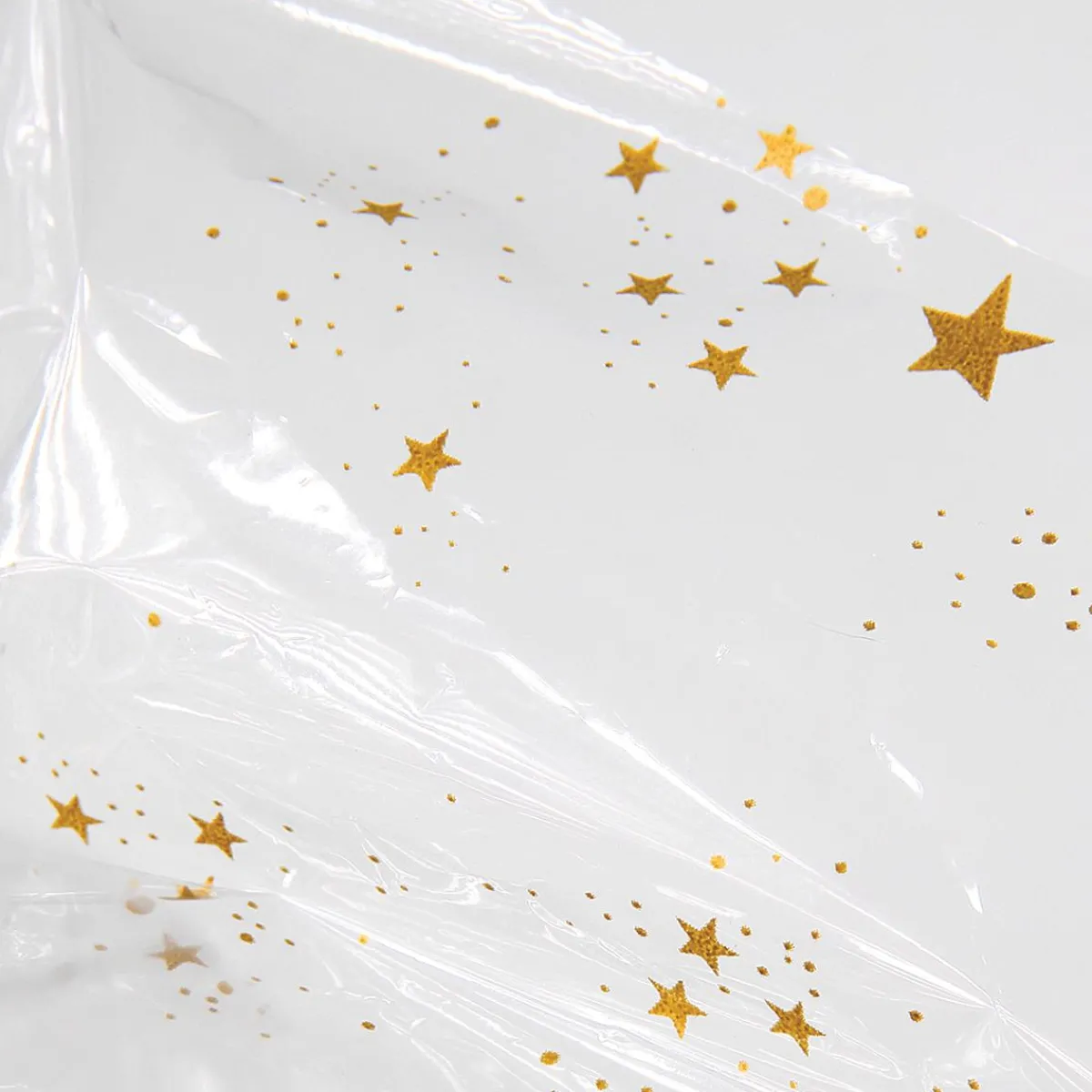 Online DecoWoerner Geschenkfolie Sterne 70 Cm, 100 M transparent